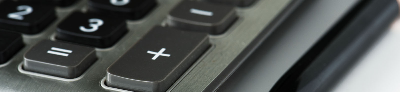 calculator and a pen