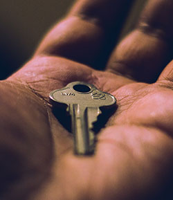 tenant navigation dropdown picture of a key in a hand